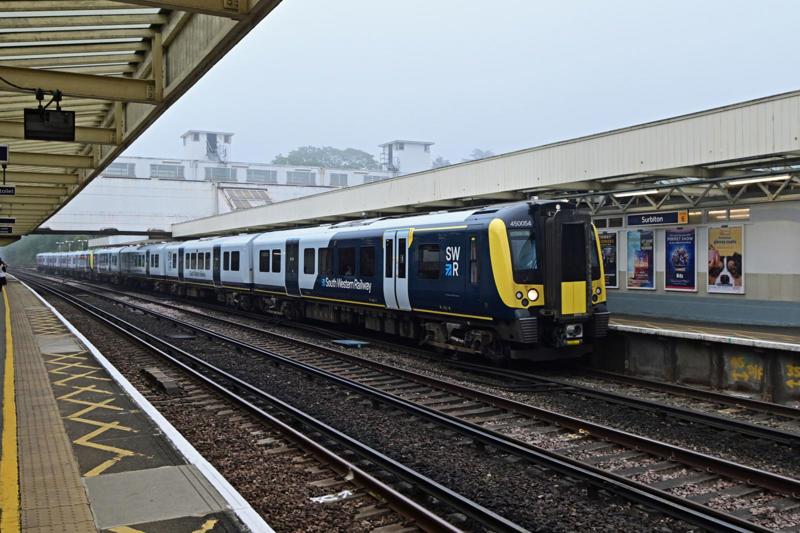 A pair of Siemens Class 450s call at a foggy Surbiton with a service to Portsmouth Harbour. The station is a classic example of inter-war, art deco architecture, which makes it well worth a visit. RAIL photography: PAUL BIGLAND