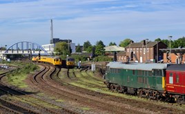 DCRail 31452 and 56303 are stabled as Colas Rail 37099 propels a Crewe-Derby test train into Derby on May 20. PAUL ROBERTSON.