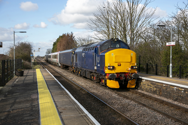 Rail Operations Group 37423, with 37901 Mirrlees Pioneer on the rear, works through Manea on February 25 with the 1115 Leicester LIP-Ely Papworth, conveying ex-Transport for Wales 175010. KEITH PARTLOW.