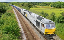 DC Rail has agreed a new three-year maintenance contract for its Class 60s with UK Rail Leasing. On June 22, DC Rail 60055 Thomas Barnardo and 60029 Ben Nevis approach Westbury with a loaded train from Whatley Quarry. On arrival at Westbury, the train was split in two with 60029 hauling one half to Willesden and 60055 departing an hour later with the other part to Bristol. MARK PIKE.