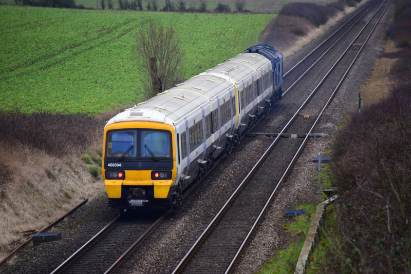 Ex-Southeastern 466004 and 466009 are hauled by 37800 past Abbotswood Junction on February 13, with the 0852 Ely Papworth Sidings-Newport Docks scrap move. STEPHEN WIDDOWSON.