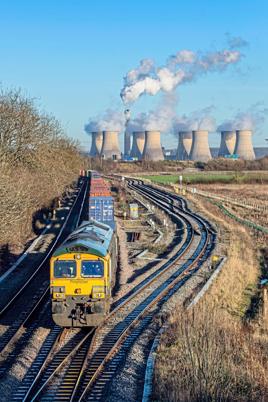 Freightliner 66504 overshadowed by Ratcliffe-on-Soar power station. The company wants guaranteed train paths. Pic: JACK BOSKETT