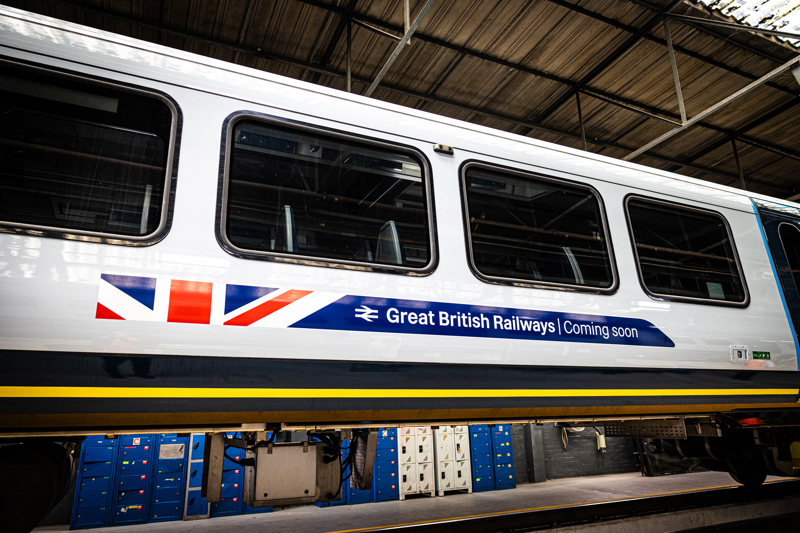 Great British Railways teaser on the side of a South Western Railway train. DEPARTMENT FOR TRANSPORT.