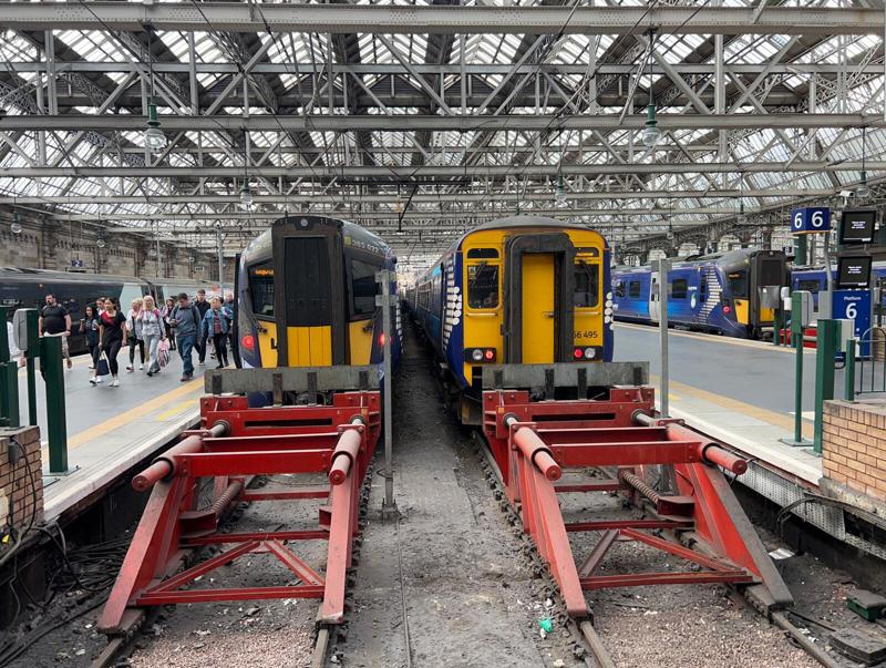 Glasgow Central is Scotland’s busiest station. As well as commuter and semi-fast trains, Sleeper and inter-city trains also use the terminus. 385022 has just arrived with the 0852 from Lanark-Glasgow Central, while 156495 has arrived from Kilmarnock.