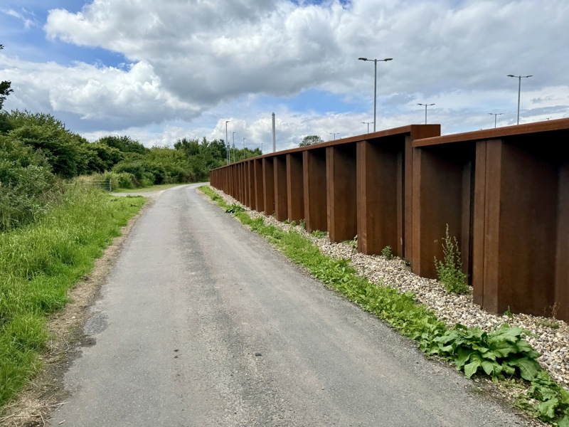 The steel retaining wall at Manningtree station car park. DEDHAM VALE SOCIETY.