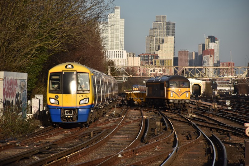 London Overground’s 378207 is flanked by GB Railfreight’s 69003 at Clapham Junction on January 30. A South Western Railway Class 455 is in the background. PETER MUGRIDGE.