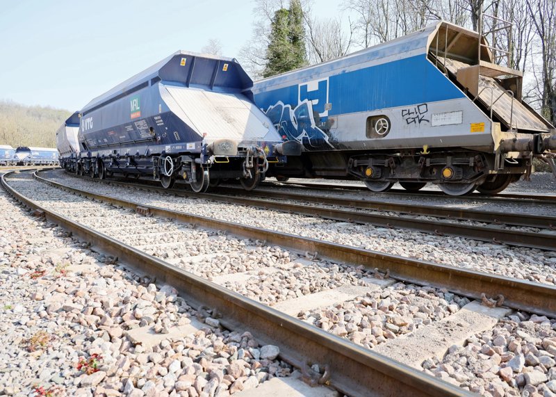 A new HOA hopper alongside an older O&K variant. TOTAL COMMERCIAL PHOTOGRAPHY.