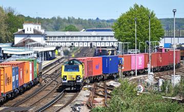 Freightliner 70011 negotiates Eastleigh station with the 0641 Crewe Basford Hall to Southampton Maritime on April 30, as GB Railfreight 66728 Institution of Railway Operators works the 1147 Southampton Western Docks to East Midlands Gateway. The two companies hold the biggest share of UK freight operations, with intermodal a growth area. MARK PIKE.