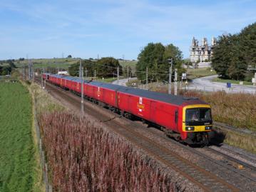 Royal Mail 325015 and 325005 at Hardendale with the 1419 Shieldmuir-Daventry service on September 16. The company is dispensing with its 30-year-old units and putting more of its business onto roads. PAUL SHANNON.