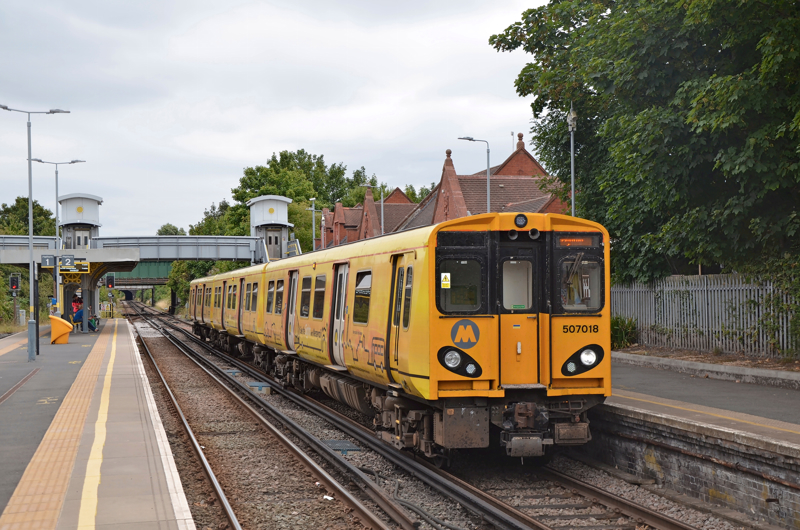 Merseyrail's 507018 at Birkenhead North. HOWARD JOHNSTON.