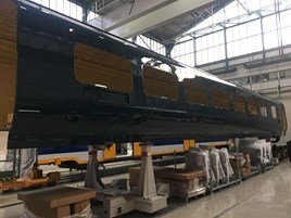 A completed Caledonian Sleeper Mk 5 bodyshell in CAF's Beasain factory, northern Spain. CALEDONIAN SLEEPER.