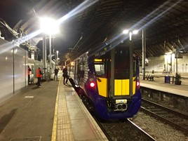 ScotRail 385103 waits at Glasgow Queen Street before leaving with February 6’s 2107 test run to Edinburgh. It arrived on time at 2212, having stopped at six stations and been held for red signals on a schedule that included 15 minutes of pathing time. Unlike current Class 170s, the new trains have gangways between units, allowing passengers and staff through a whole train. PHILIP HAIGH.