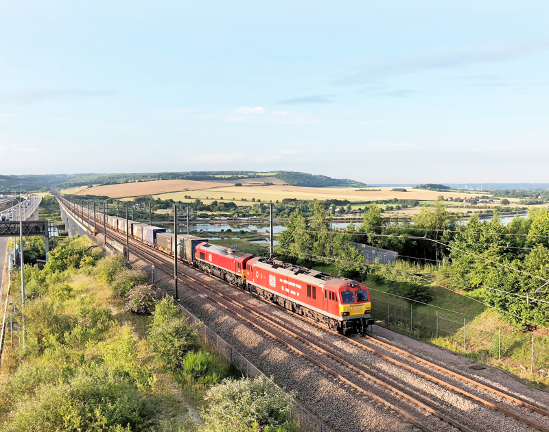 DB Cargo 92015 leads DB 66017 across the Medway Viaduct on HS1 on July 5 2019, with a Dollands Moor-Ripple Lane freight. HOWARD LEWSEY.