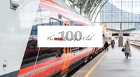 The Rail 100 Breakfast Club logo over a train in a station