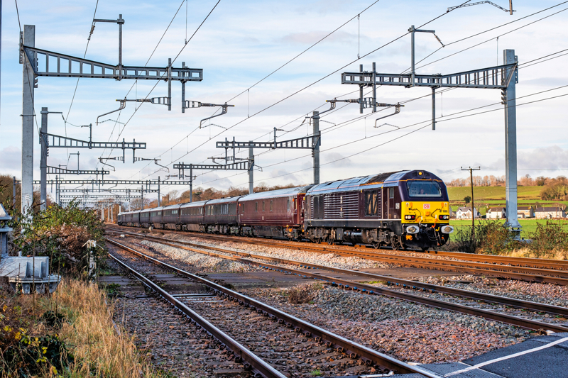 The Royal Train, led by 67005, passes Bishton Crossing heading East, having just picked up HRH's Duke and Duchess of Cambridge from Cardiff Central as part of their Royal tour by train around the UK. After Cardiff they visited Bath. JACK BOSKETT.