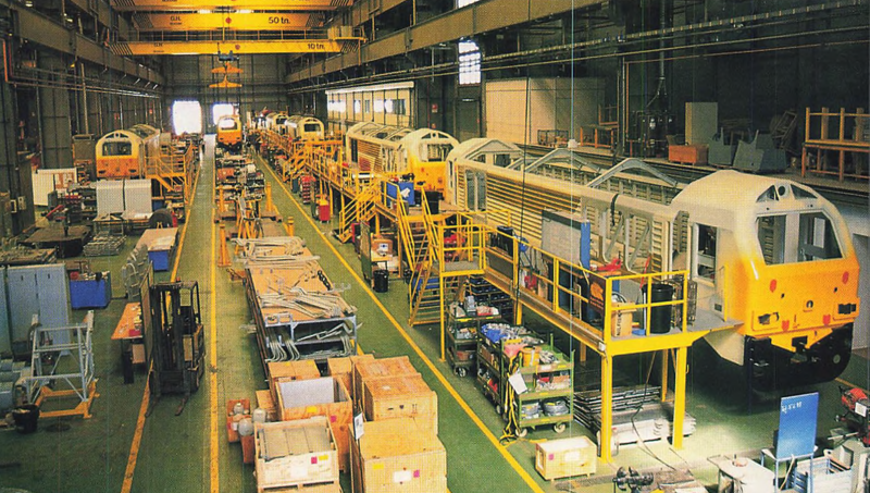 The workshop floor at Alstom Valencia in September 1999 shows the production line for the Class 67 fleet. In the right foreground is 67011, with 67010, 67008, 67007 and 67001 behind. The centre of the floor is 67012 and 67009 is on the left hand side. The locomotives have their yellow ends and gold 'thunderflashes' applied before being sent to the paintshop. PIP DUNN.