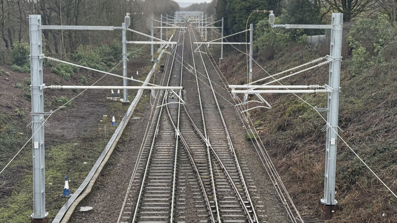 The newly installed power lines between Wigan and Bolton. NETWORK RAIL.